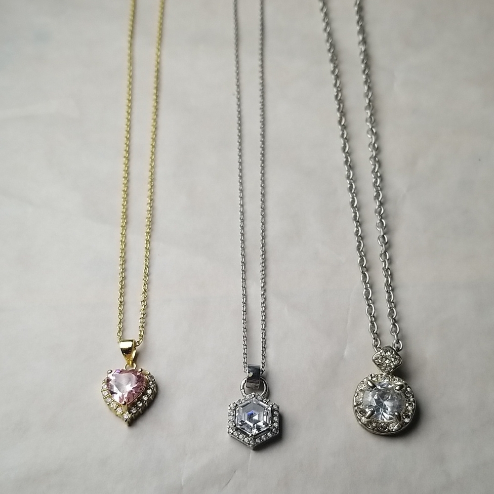 Set Of Three Costume Jewelry Necklaces In Gold And Silver Tones